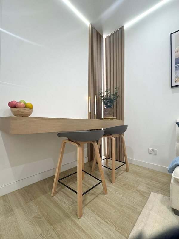 Timber desk nook with two stools